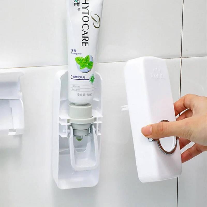 TOOTH PASTE DISPENSER WITH STORAGE FOR TOOTH BRUSHES
