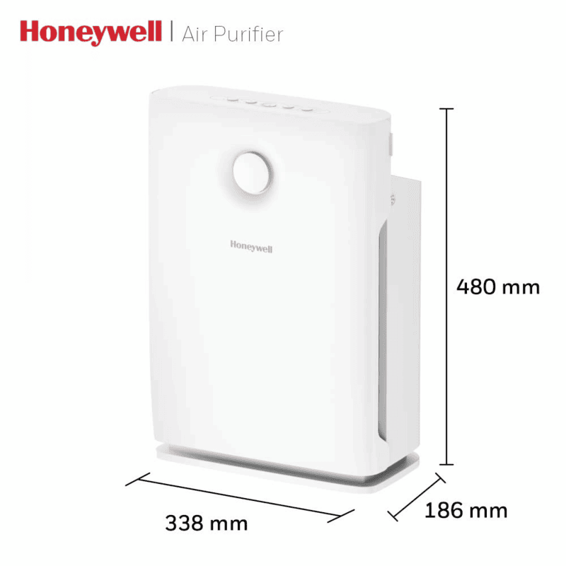 Honeywell Air Touch V3 home air purifier placed near a living room sofa.
