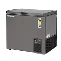 A person easily moving the Voltas deep freezer using its built-in rollers.