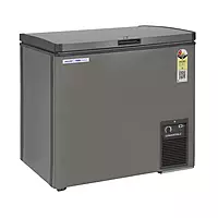 The secure door lock on the Voltas Hard Top Convertible Deep Freezer, with a key in the lock.