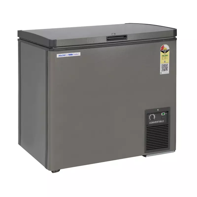 The secure door lock on the Voltas Hard Top Convertible Deep Freezer, with a key in the lock.