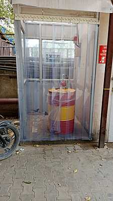 Buzz Lite PVC Strip Curtain effectively preventing dust and debris from entering a workspace Buzz Lite PVC Strip Curtain effectively preventing dust and debris from entering a workspace