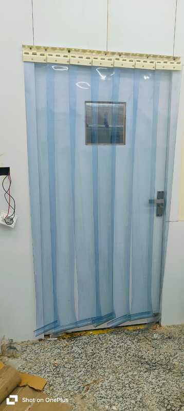 Installation of Buzz lite Climate Control Pvc strip curtain at storage door.