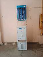 An authorized technician performing installation of the Power Jal Reverse Osmosis Water Purifier. An authorized technician performing installation of the Power Jal Reverse Osmosis Water Purifier.