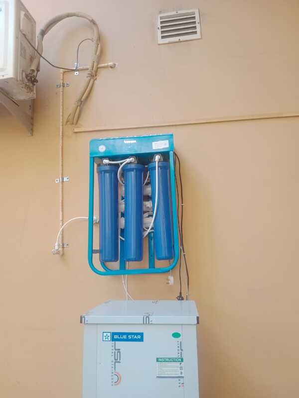 The Power Jal Pro Stream 25 A connected to a water cooler, creating a complete hydration station.