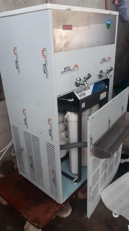 A technician servicing the Power Jal Aqua Cool 50 C to ensure optimal performance.