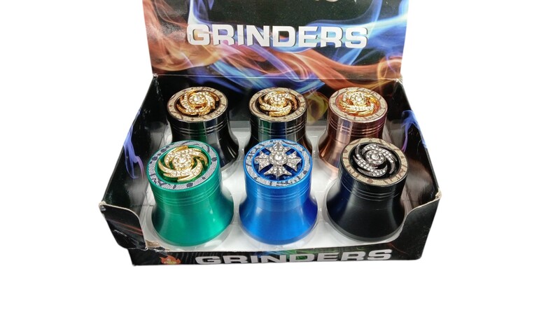 GRINDER WITH SPIINER