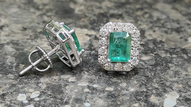 Green emerald with halo of diamond ear studs