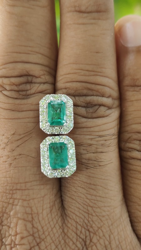 Green emerald with halo of diamond ear studs