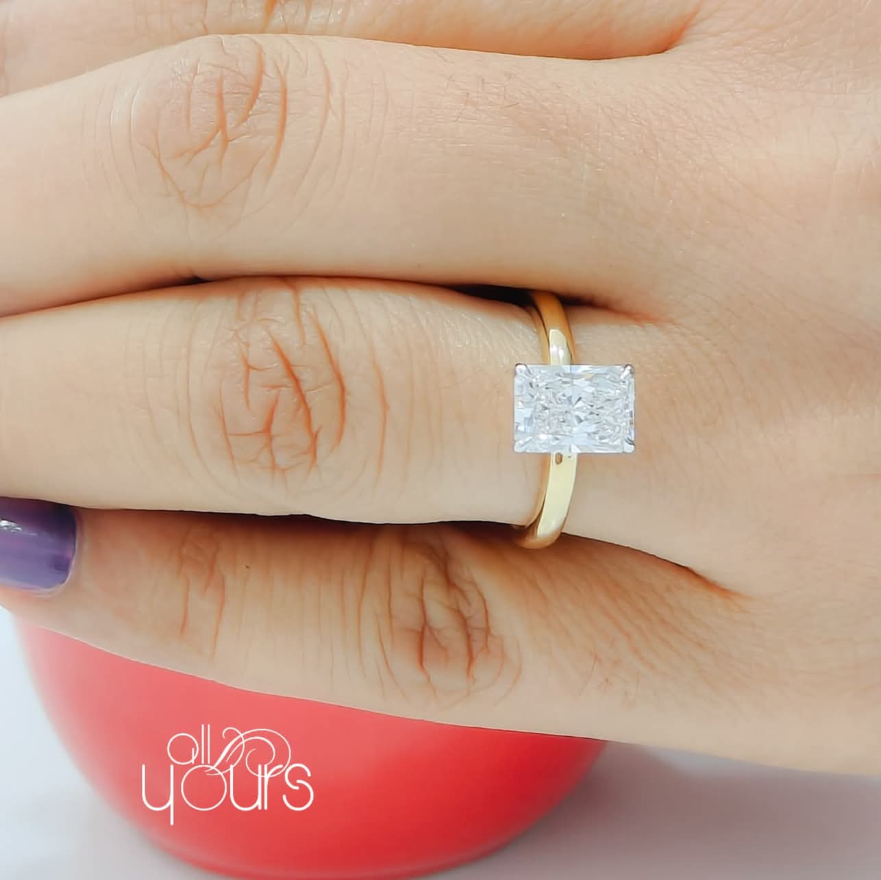 Radiant cut diamond ring
