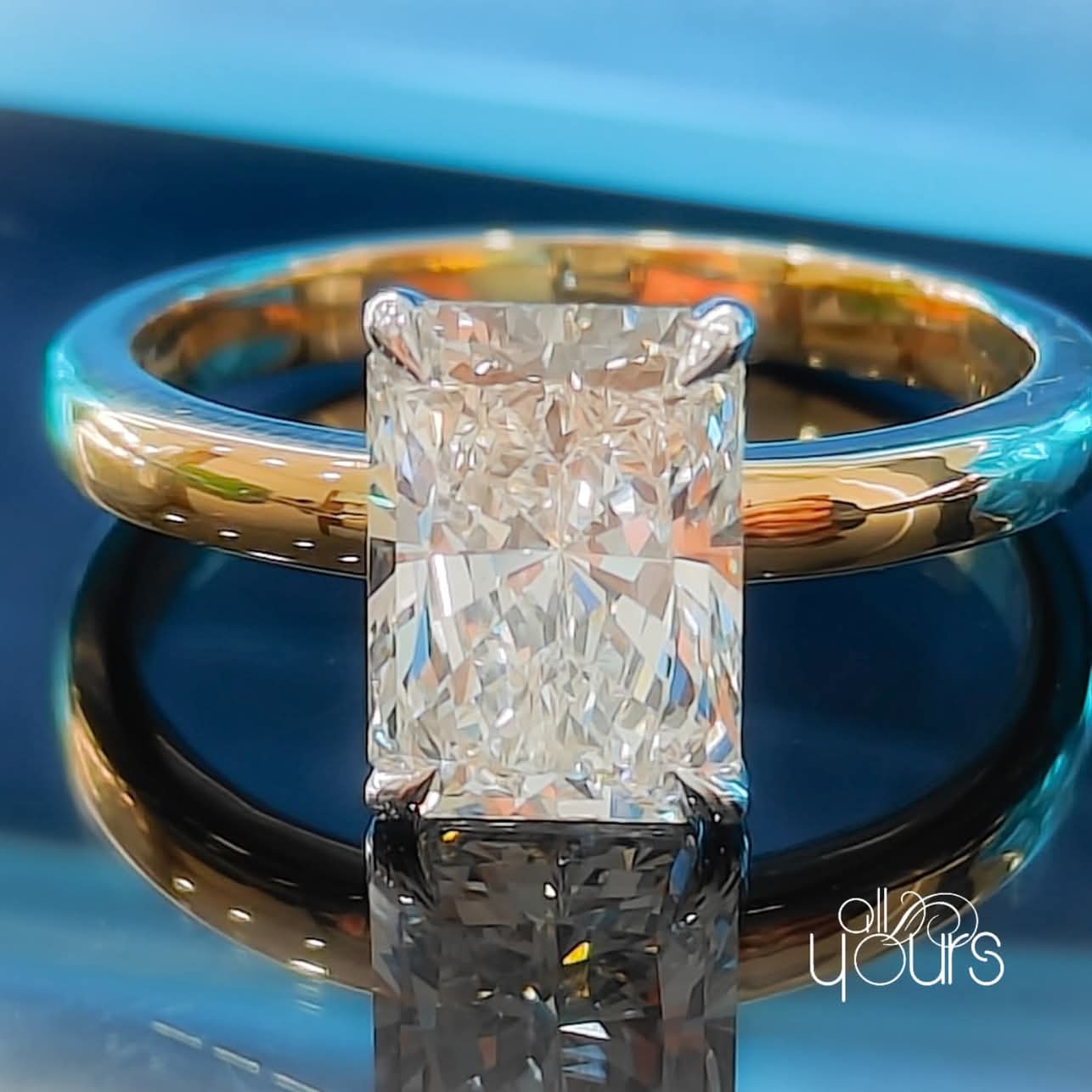 Radiant cut diamond ring