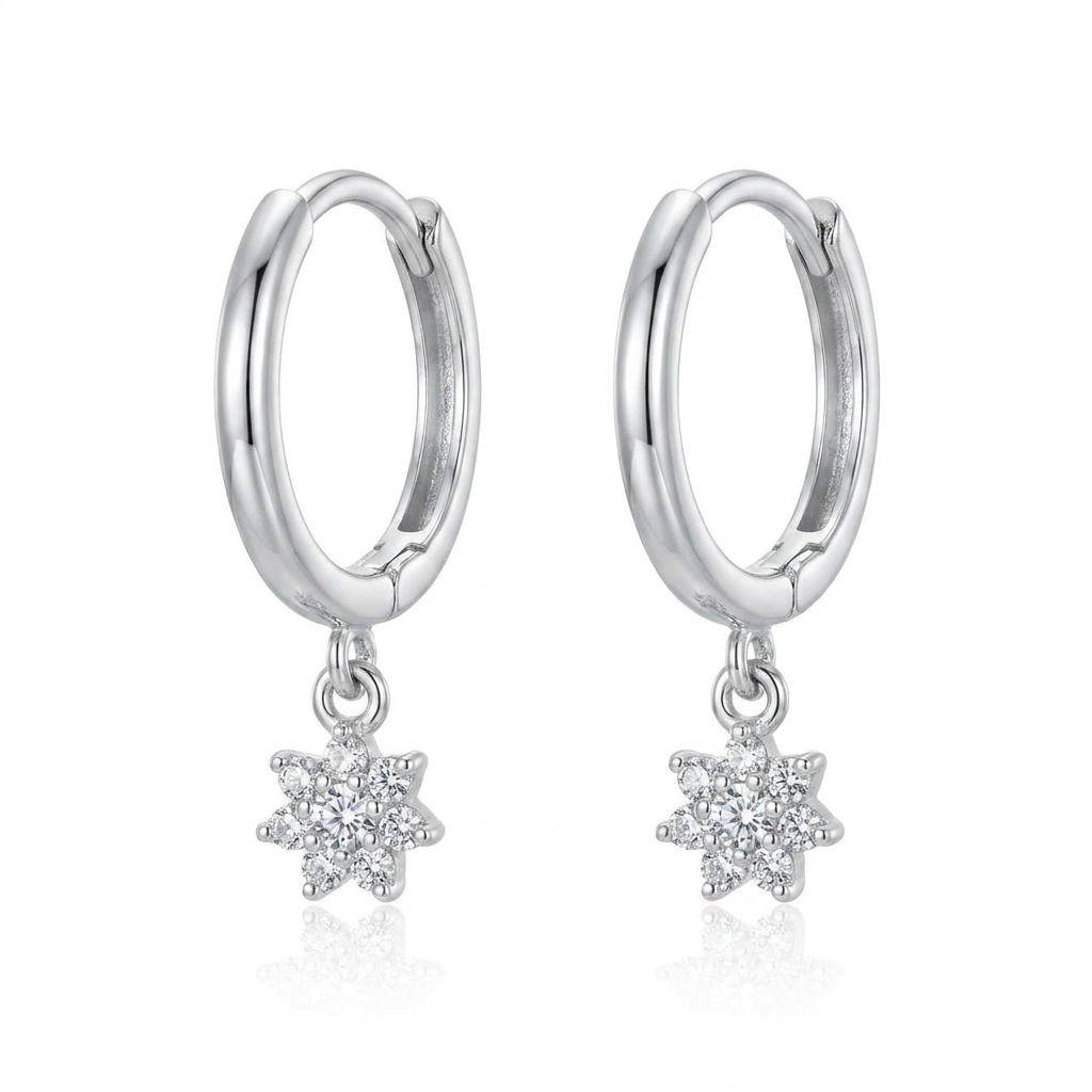 14K WG HUGGIES COLGANDO UNA FLORECITA CH DE DI 0.15CT