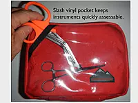 Vinyl slash pocket safely keeps multiple tools accessible.