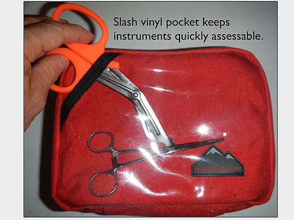 Vinyl slash pocket safely keeps multiple tools accessible.