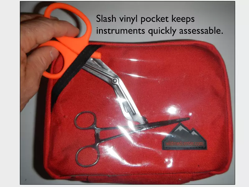 Vinyl slash pocket safely keeps multiple tools accessible.