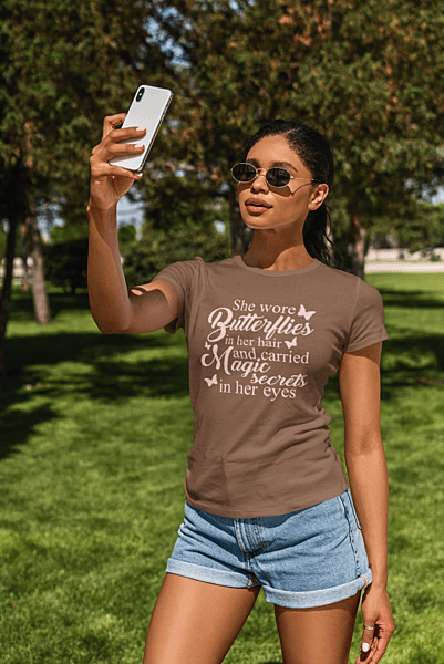 She Wore Butterflies In Her Hair And Carried Magic Secrets In Her Eyes Chest Nut BELLA + CANVAS Unisex T-shirt