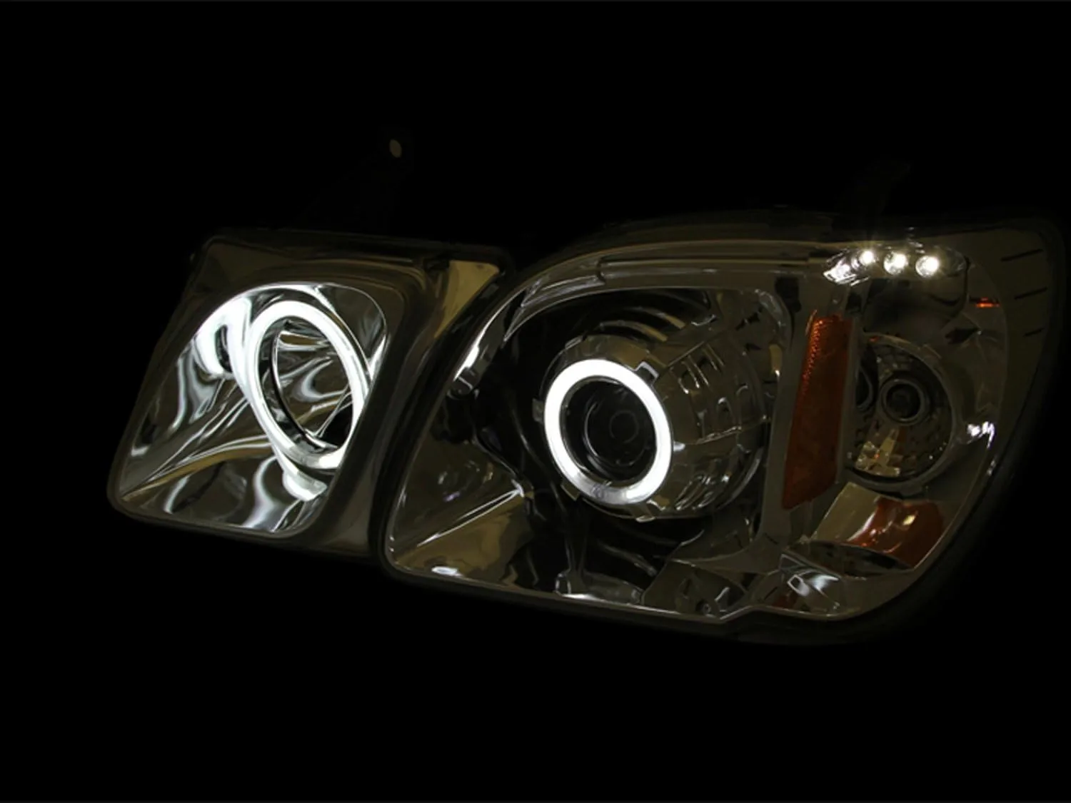 AnzoUSA 111169 Chrome Clear Projector Halo Headlight for Lexus LX470 (Sold in Pairs)