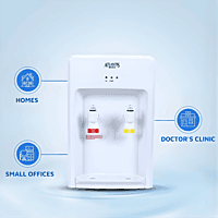 Portable Atlantis Basic Mini water dispenser standing next to a glass of fresh water.