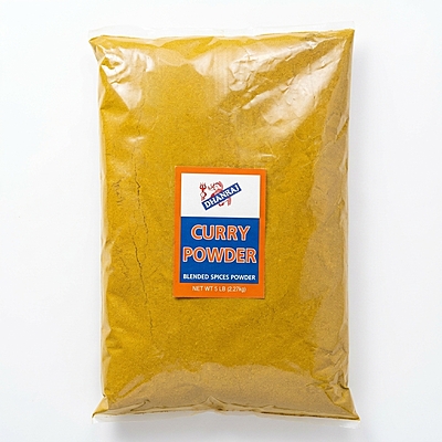 Curry Powder featuring a vibrant, aromatic yellow spice blend for professional and home cooking