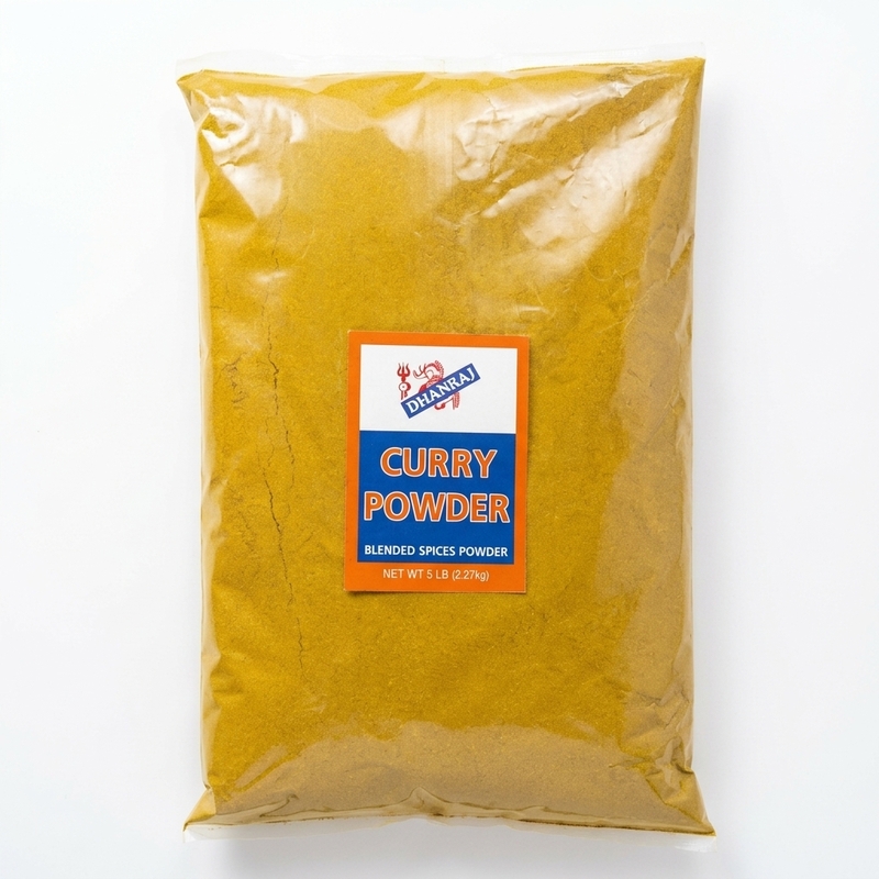 Curry Powder featuring a vibrant, aromatic yellow spice blend for professional and home cooking