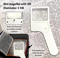 Mini magnifier with torch