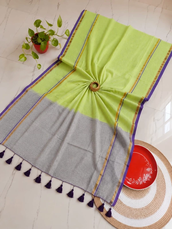 Pure 120 count soft Kadhi Mulmul cotton a light green body paired with a gray pallu