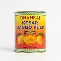850g of premium Kesar Mango Pulp showing smooth golden mango puree for authentic Indian desserts.