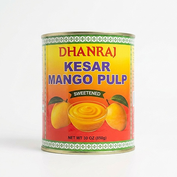 850g of premium Kesar Mango Pulp showing smooth golden mango puree for authentic Indian desserts.