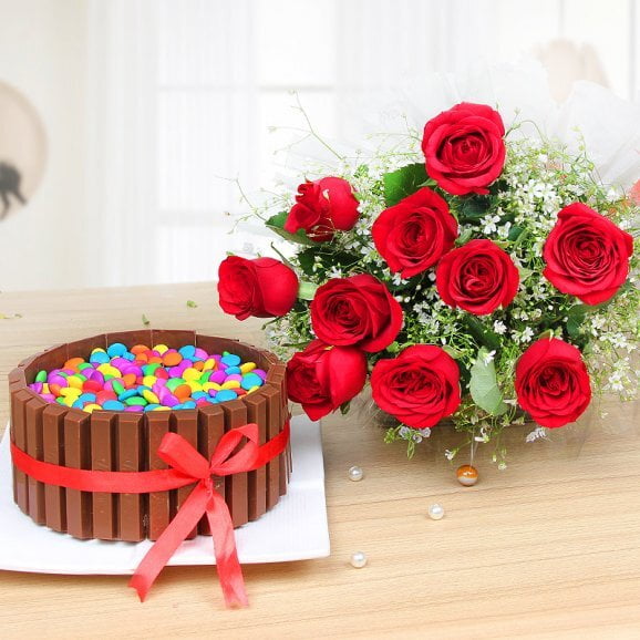 A bunch of roses with Kit Kat cake A bunch of roses with Kit Kat cake