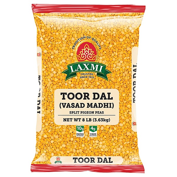 8lb bag of Laxmi Toor Dal with a traditional oily coating for natural preservation and rich flavor