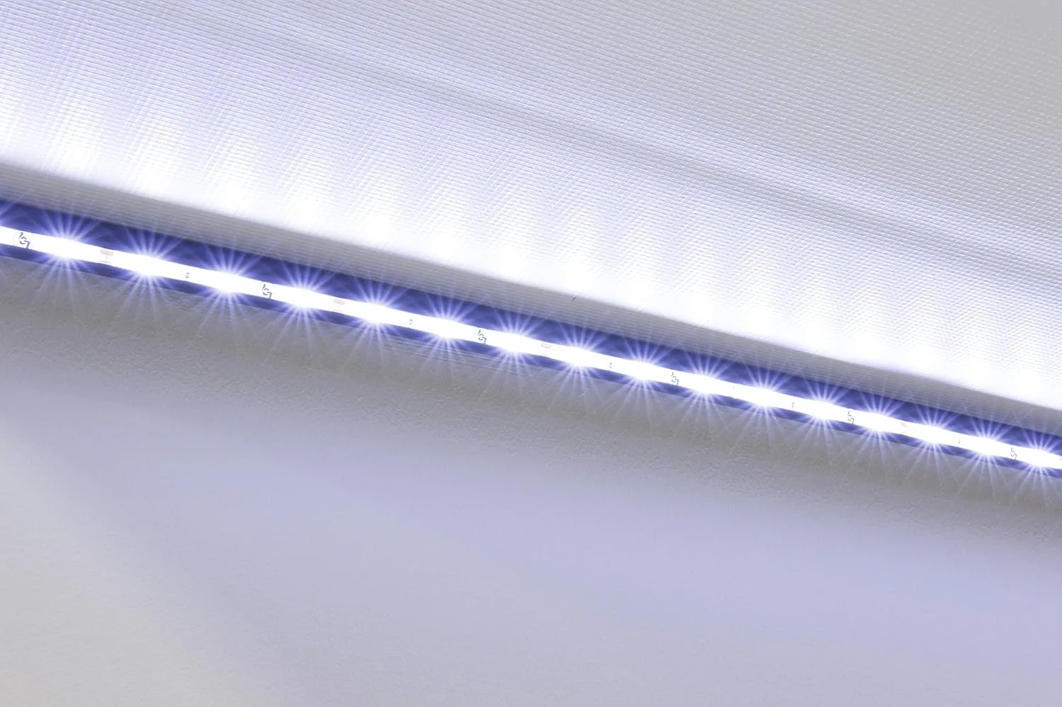Solera RV Awning Fabric White LED Light Kit with Switch and Plate for 10’-15’ Awnings, Cut-to-fit, Flexible Black Plastic Strip with Lights, Integrated Cord, Visible Extended or Retracted - 674282