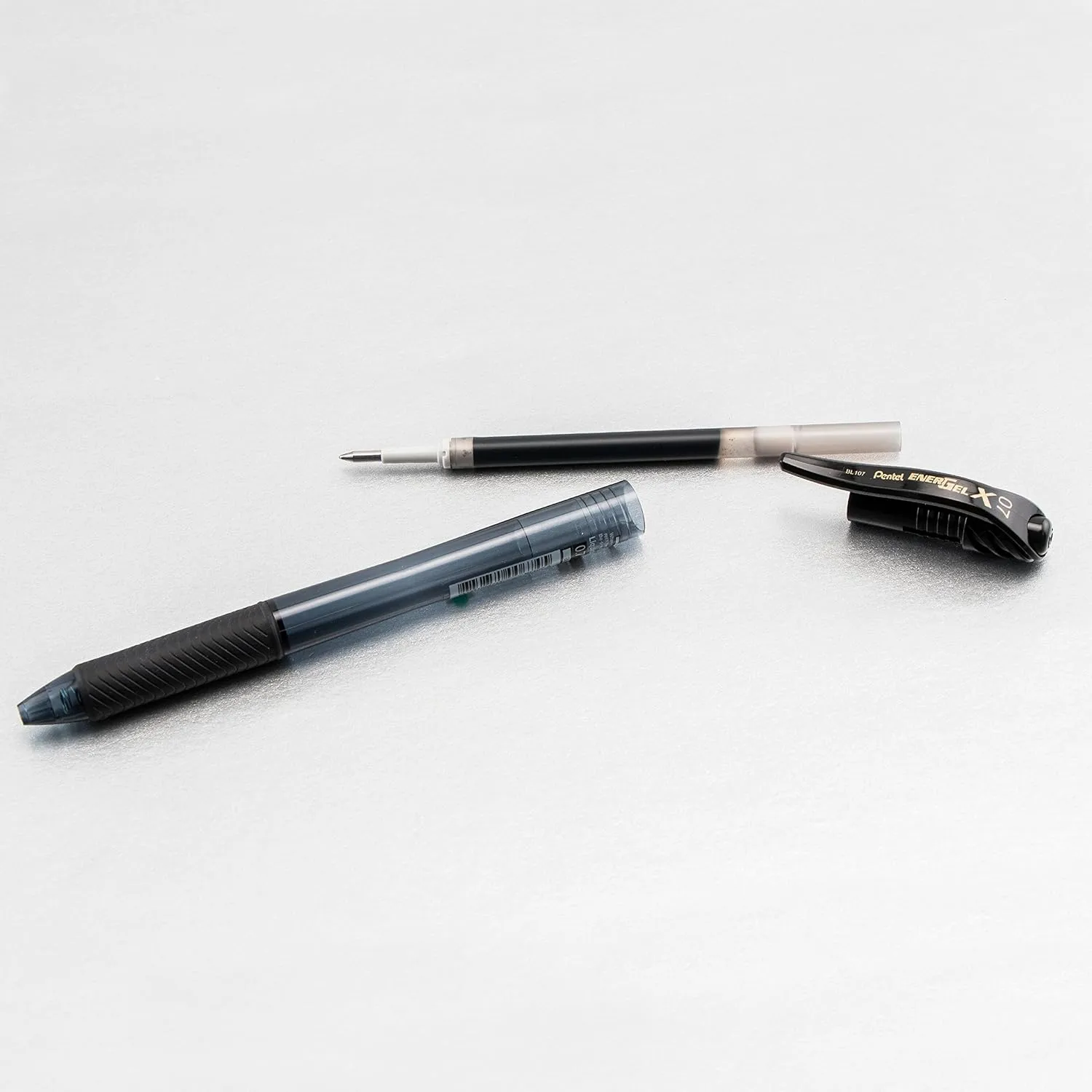 Pentel EnerGel X Retractable Liquid Gel Pens, Medium Point, 0.7 mm, 84% Recycled, Assorted Barrels, Black Ink, Box Of 12 Pens