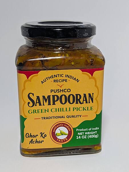 14oz jar of Sampooran Green Chilli Pickle, authentic spicy and tangy Hari Mirch ka Achar.