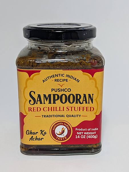 Jar of Sampooran Stuffed Red Chilli Pickle, authentic spicy Banarasi style Lal Mirch Achar.