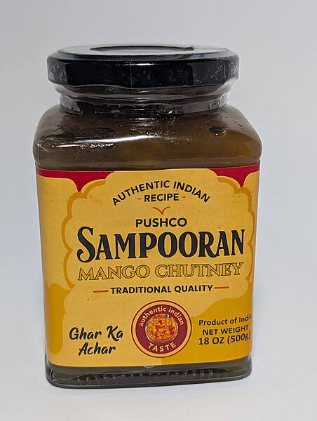 Jar of Sampooran Sweet Mango Chutney, an authentic Indian fruit preserve and dip.