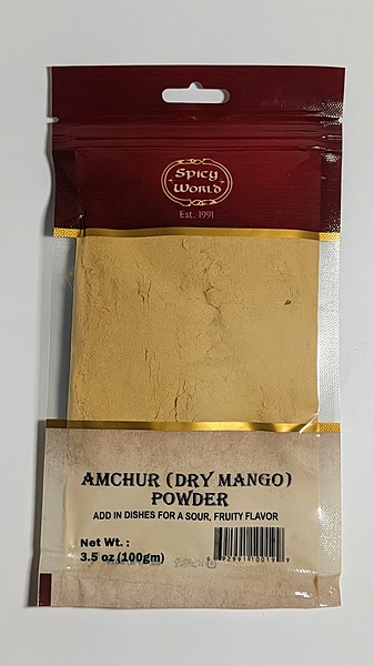3.5oz jar of Spicy World Amchur Powder, a tangy and citrusy dried mango powder for Indian cooking.