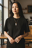 Large Shell Pendant With Gold and Emerald Accents