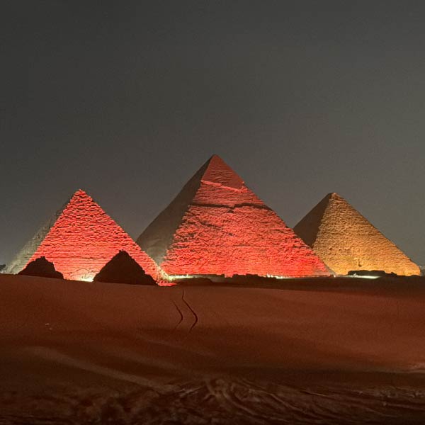 Breathtaking view of pyramids with dramatic fetival lighting Breathtaking view of pyramids with dramatic fetival lighting