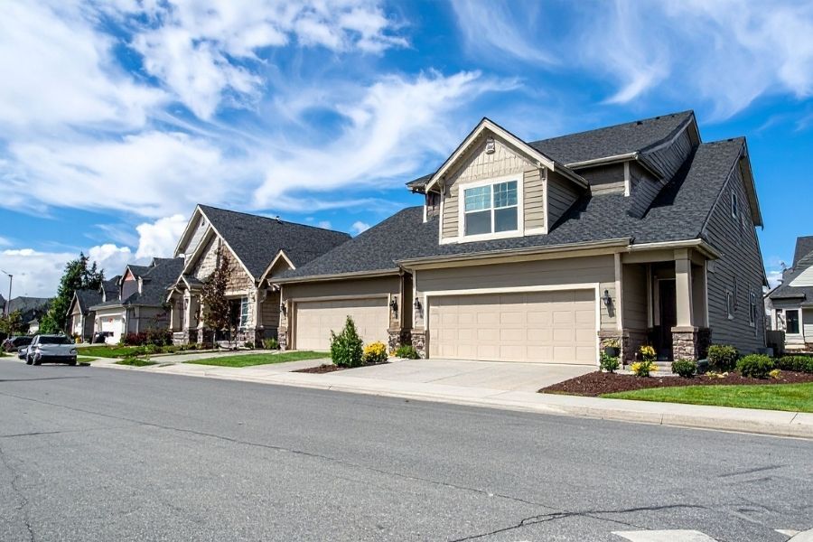 Residential neighborhood with modern homes equipped with smart locks and security access systems