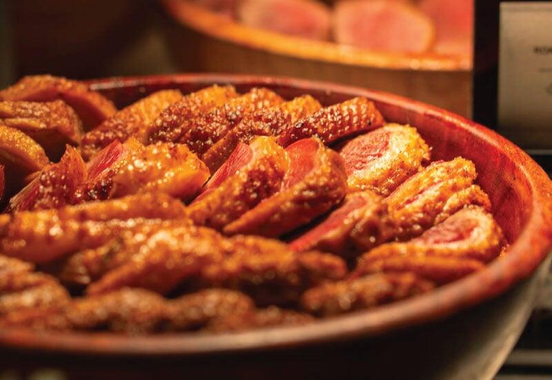 Seared duck breast on display at LOriental event