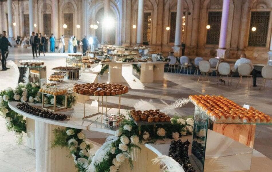 Serpentine finger food buffet display at Mohamed Ali Mosque