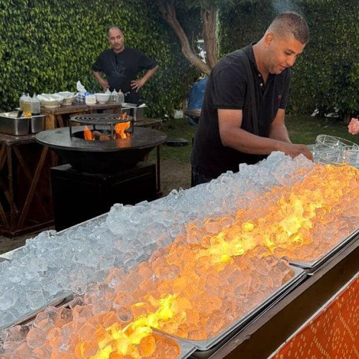 LOriental team setting up cold display of Mongolian Grill at Maison de Joie on 10 July 2026 LOriental team setting up cold display of Mongolian Grill at Maison de Joie on 10 July 2026