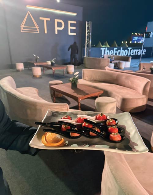Canapé tray in LOriental waiter hand inside the TPE VIP lounge