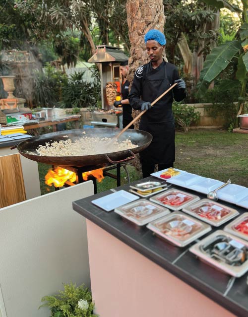 Live paella station at YouTube Shorts event on Dahab Island